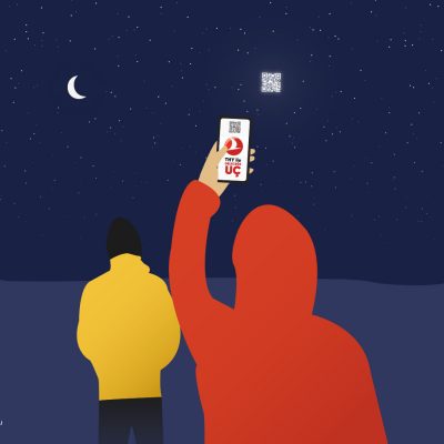 Telefonu ile uzaydaki QR kodu okutan bir genç telefonunda Türk Hava Yolları reklamı görüyor uzay reklamcılığı örneği